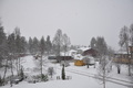 Snøbyger i Rindal i dag, her fra Moan. Foto: Jorid