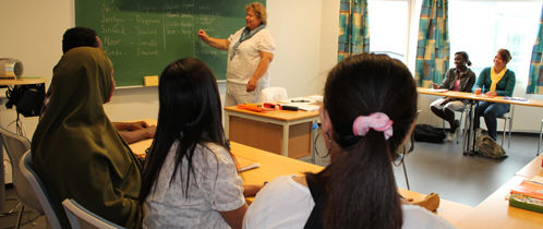 Lærer og deltakere i klasserom