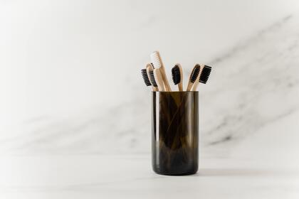 black-cup-with-toothbrush-3737593