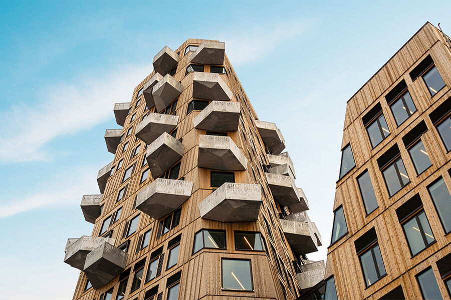 Skanska har jobbet målrettet med å redusere klimafotavtrykket i en årrekke og har en ambisjon om å kutte utslippene med 70% innen 2030. Bildet viser bygget Vertikal Nydalen som Skanska har bygget for Avantor Eiendom. Mikkel Walle
