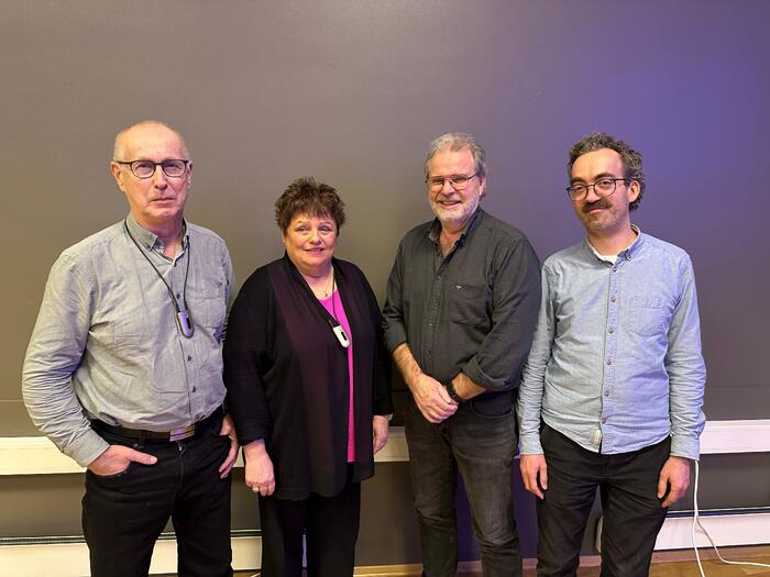 Fra venstre: Jan Reiling, Jorunn Hellerslien, Jan Joakimsen (leder) og Johannes Fure Hoff. En dame og tre menn står oppstilt foran vegg